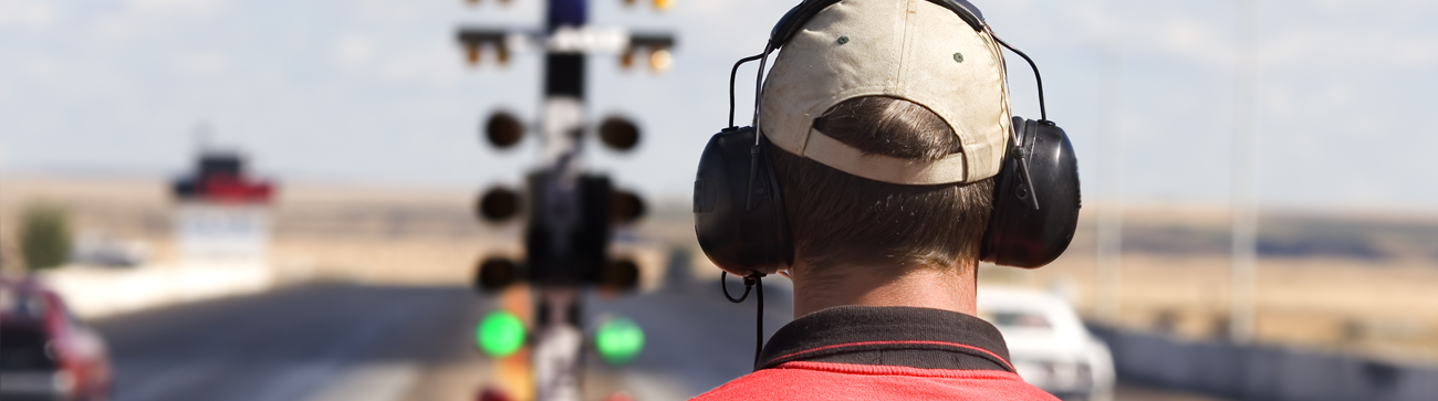 man wearing ear defenders