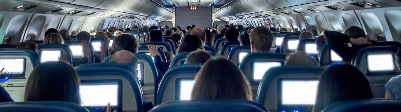 aeroplane cabin full of passengers Aerotoxic syndrome