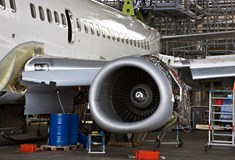 close up of aeroplane wing and jet