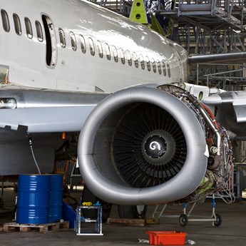 close up of aeroplane wing and jet