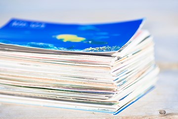 close up of a large stack of colourful paper