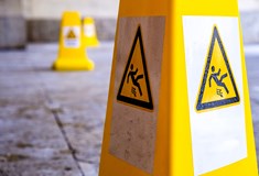 close up of yellow caution wet floor sign