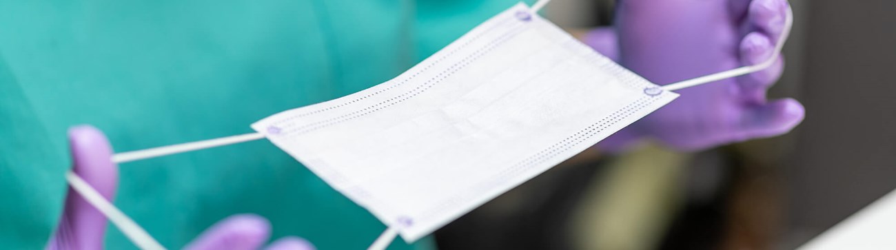 close up of white surgical disposible mask